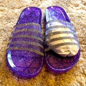 Purple jelly style sandal with glitter stripes
